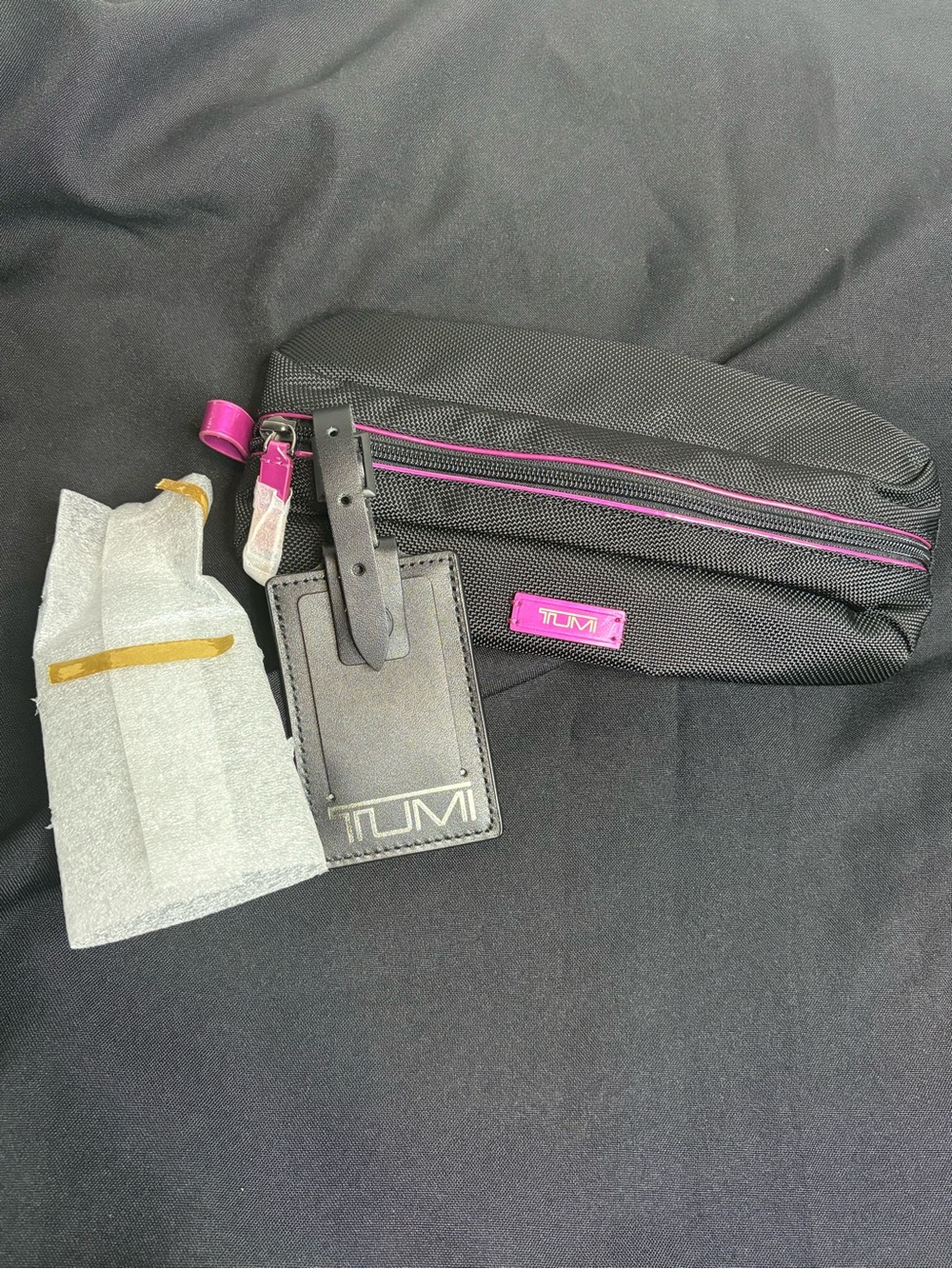 Tumi Black Travel Pouch with Pink Accents